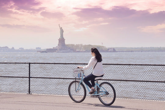 Bicyclist passing through New York