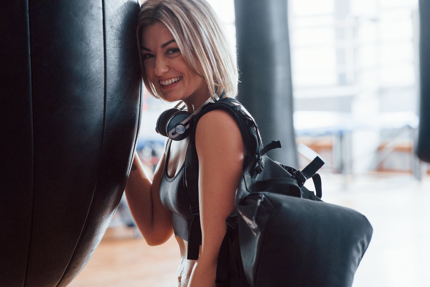 woman in gym smiling
