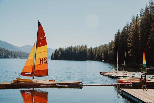 Colorful sailboat on lake
