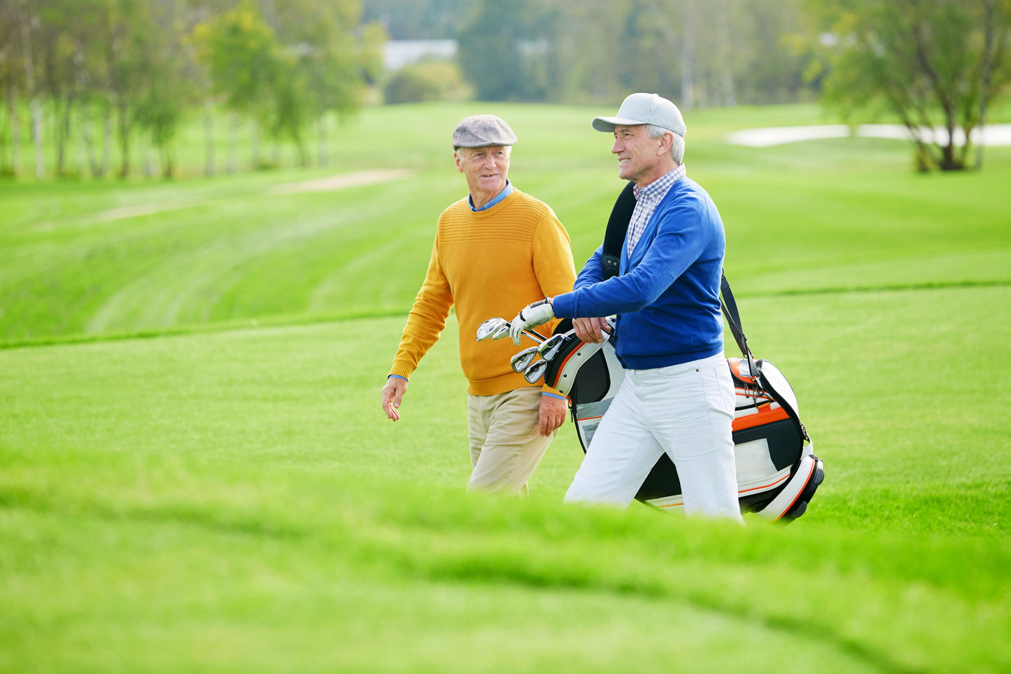 two men golfing together